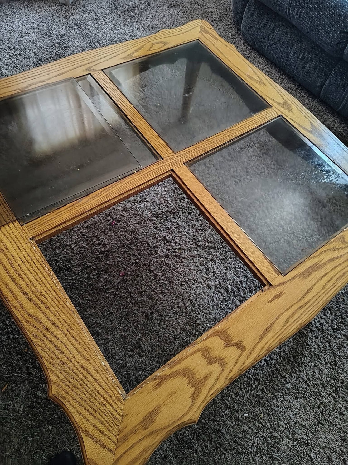 Glass-top coffee table before detailing